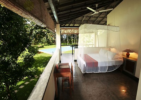 Die Deluxe Rooms liegen quasi mitten in der Natur - hier: Zimmerbeispiel Deluxe Room Upper Floor