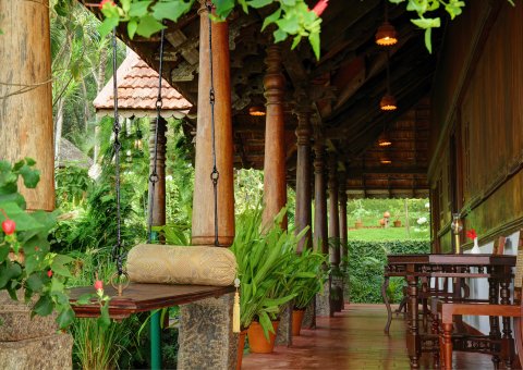 Nach Ihrer Ayurveda-Kur auf der Veranda des Kerala House entspannen