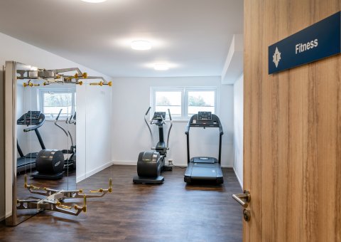Sportlich aktiv bleiben im Fitnessraum des Landhauses