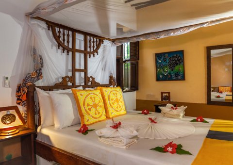 Das gemütliche Bett im Coconut Doppelzimmer