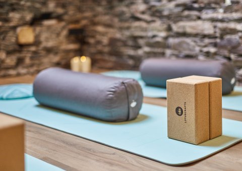 Die Yoga-Matten liegen bereit für Ihren Besuch