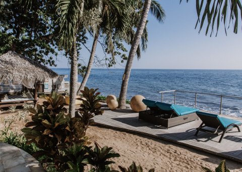 Am palmengesäumten Strand Ruhe & Erholung finden